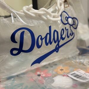 White Clutch with Blue Logo